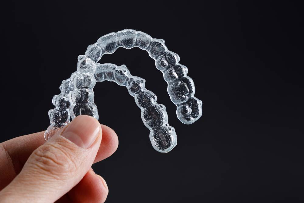 How Custom Invisalign Retainers Are Fitted and Made - Carolina