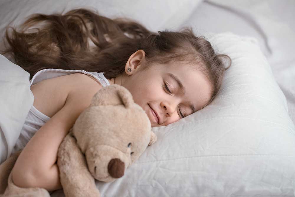 little-cute-girl-bed-with-toy